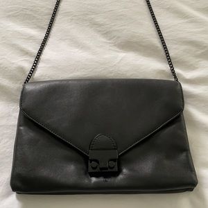 Loeffler Randal black leather crossbody bag with chain strap